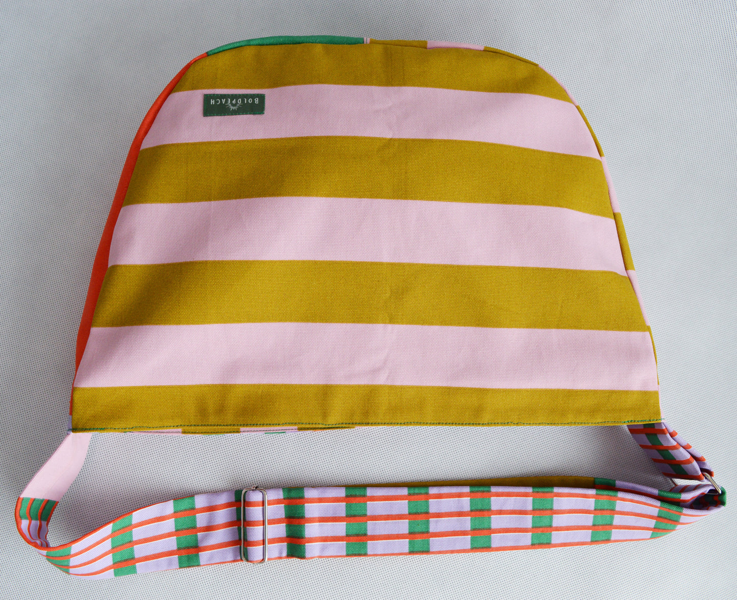 Colorful crossbody bag bike messenger bag pink yellow green striped geometric print