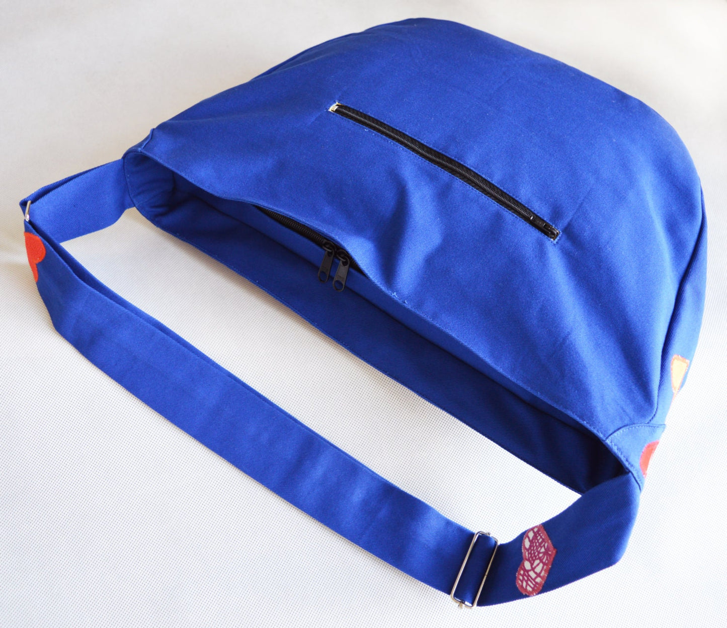 Colorful multi coloured blue crossbody bag bike messenger bag with applique hearts boheme hippie rainbow happy cycling bag