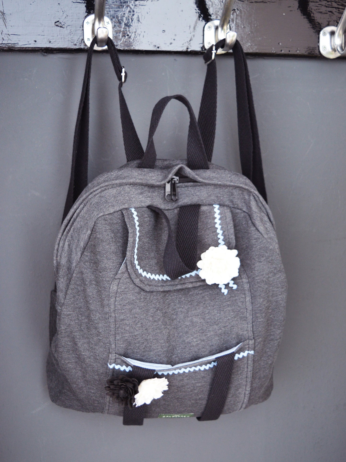 Gray backpack with romantic deatails and lots of pockets
