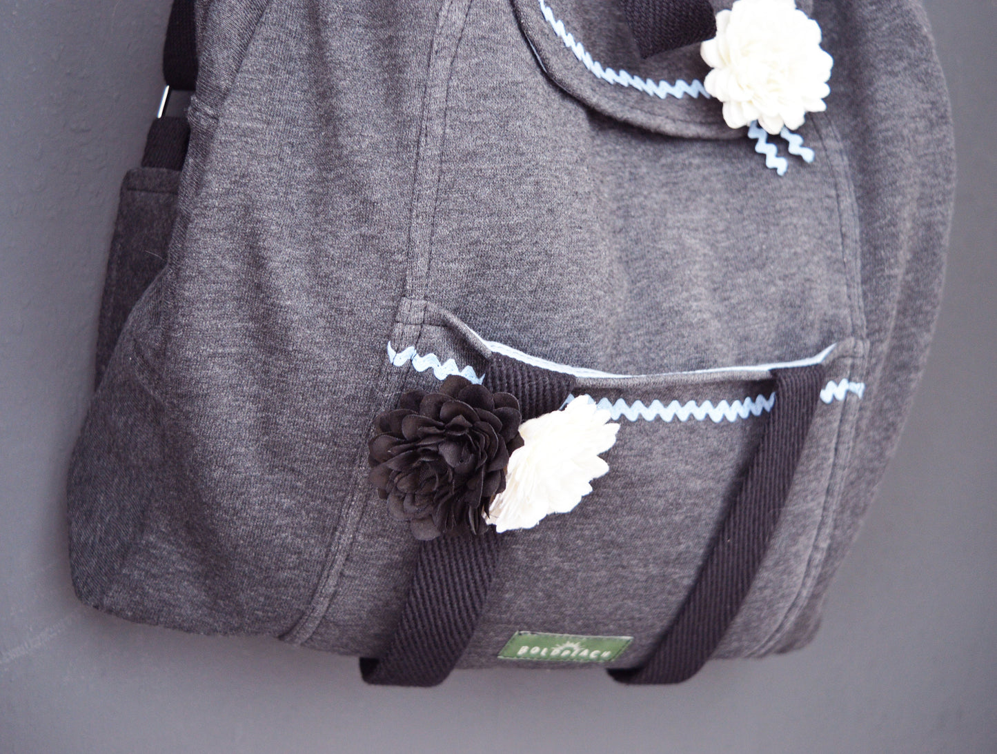 Gray backpack with romantic deatails and lots of pockets