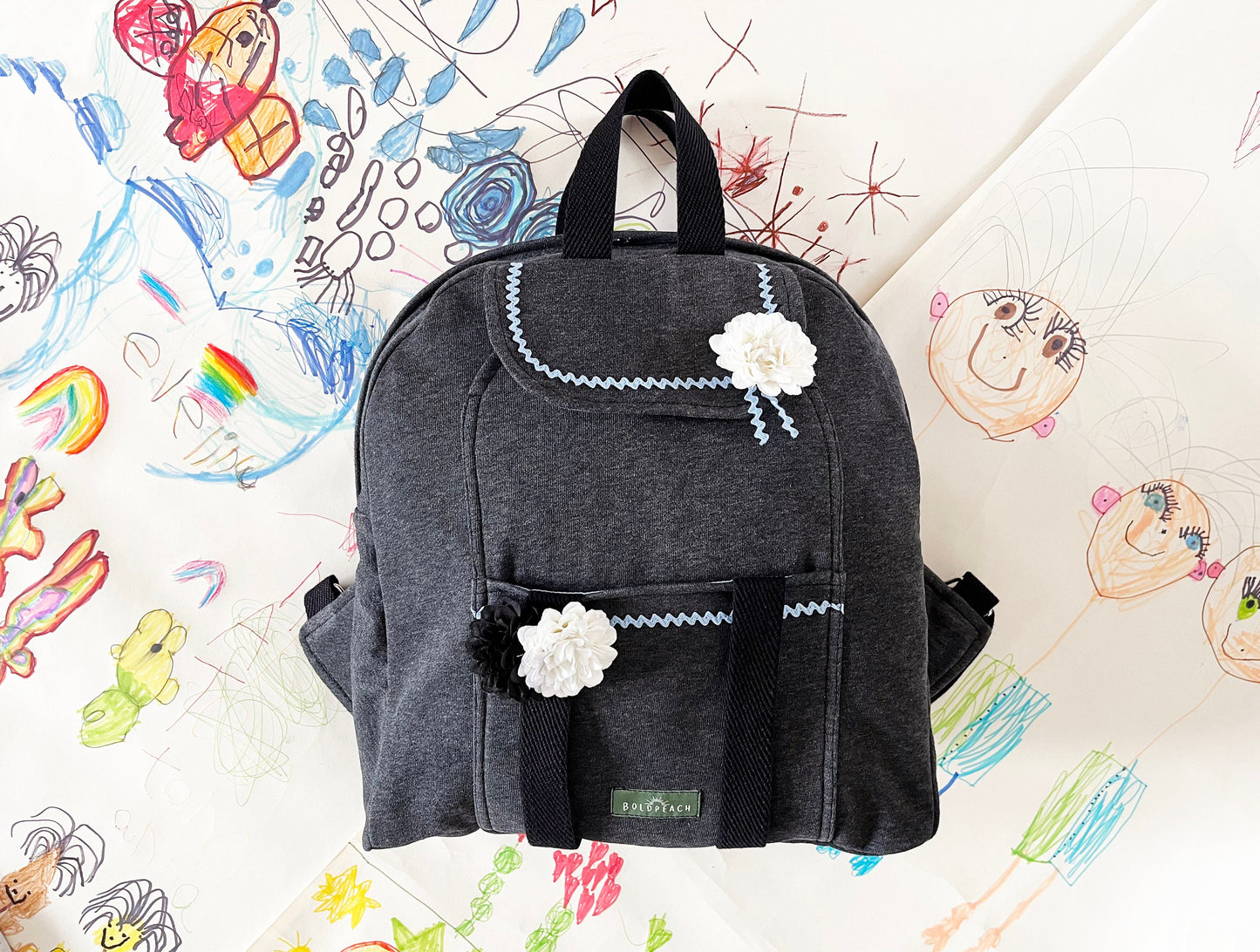 Gray backpack with romantic deatails and lots of pockets